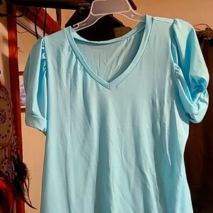 Aqua puff sleeve shirt.